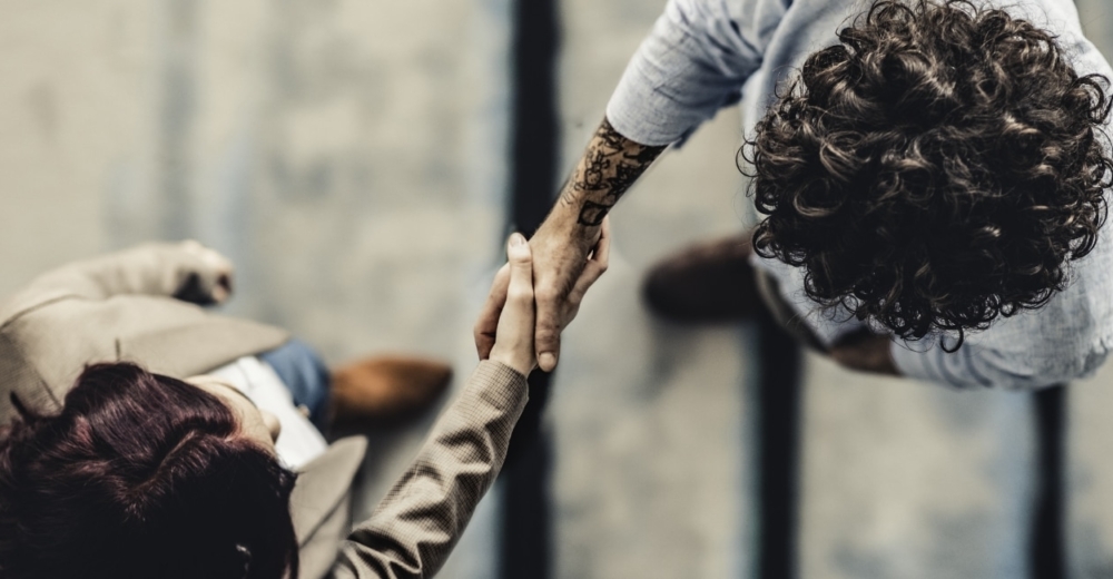 Two people shaking hands