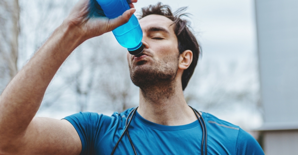 Man drinking sports drink