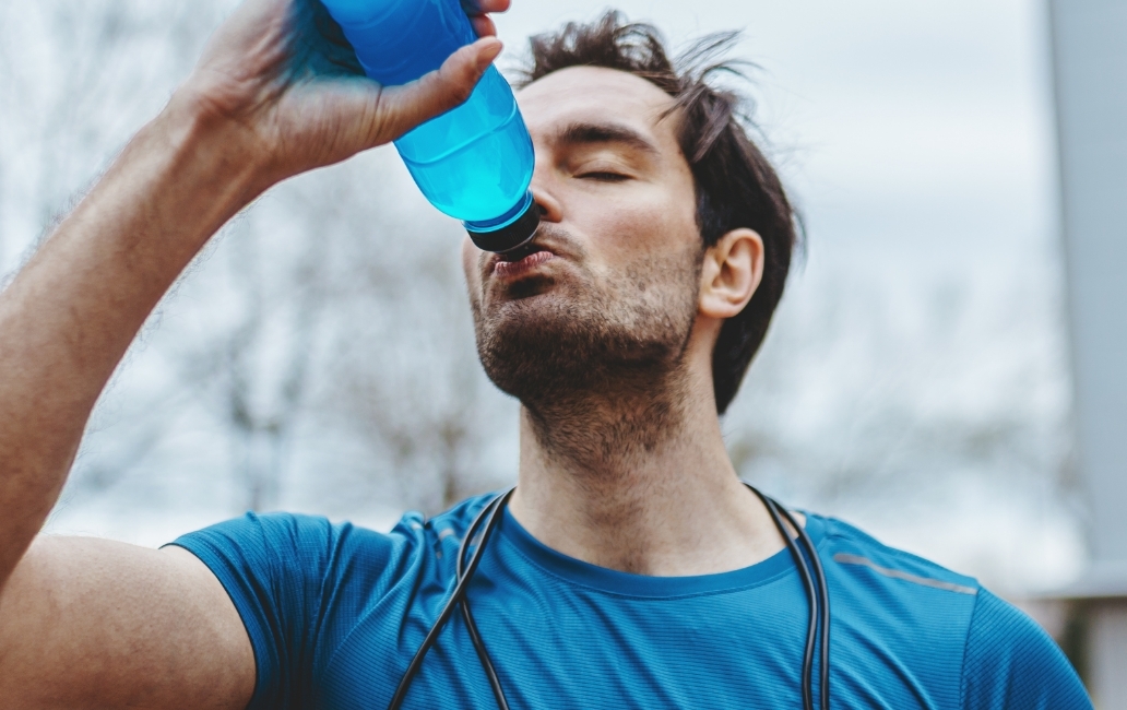 Man drinking sports drink