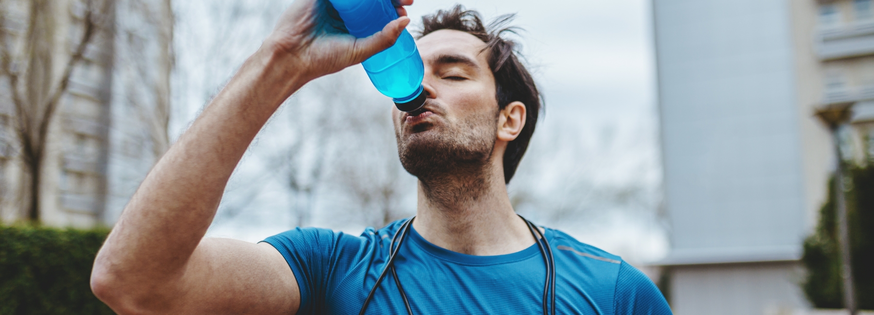 Man drinking sports drink