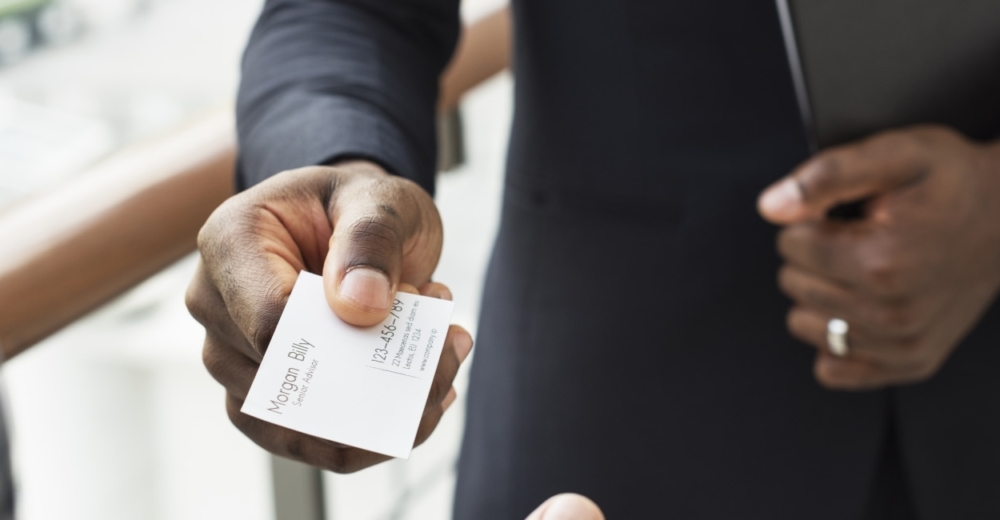 Man offering his business card