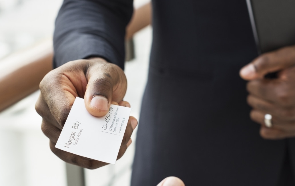 Man offering his business card