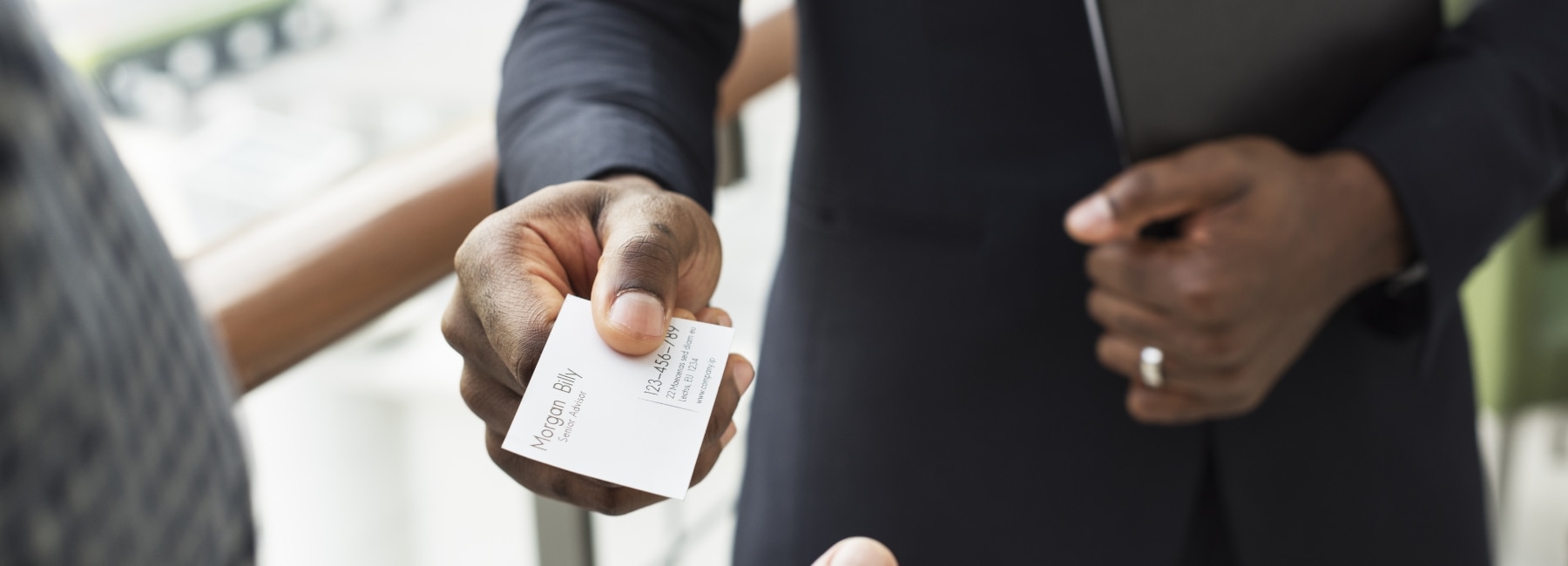 Man offering his business card