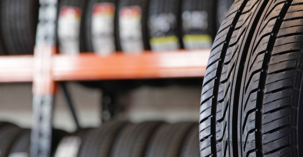 Tyre rack with several tyres in the foreground