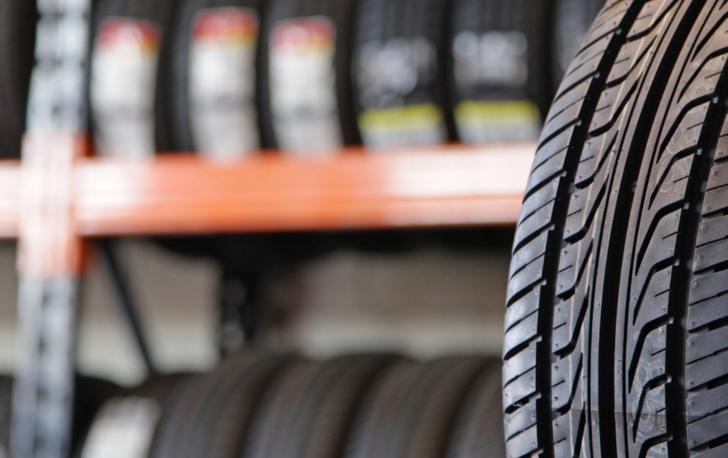 Tyre rack with several tyres in the foreground